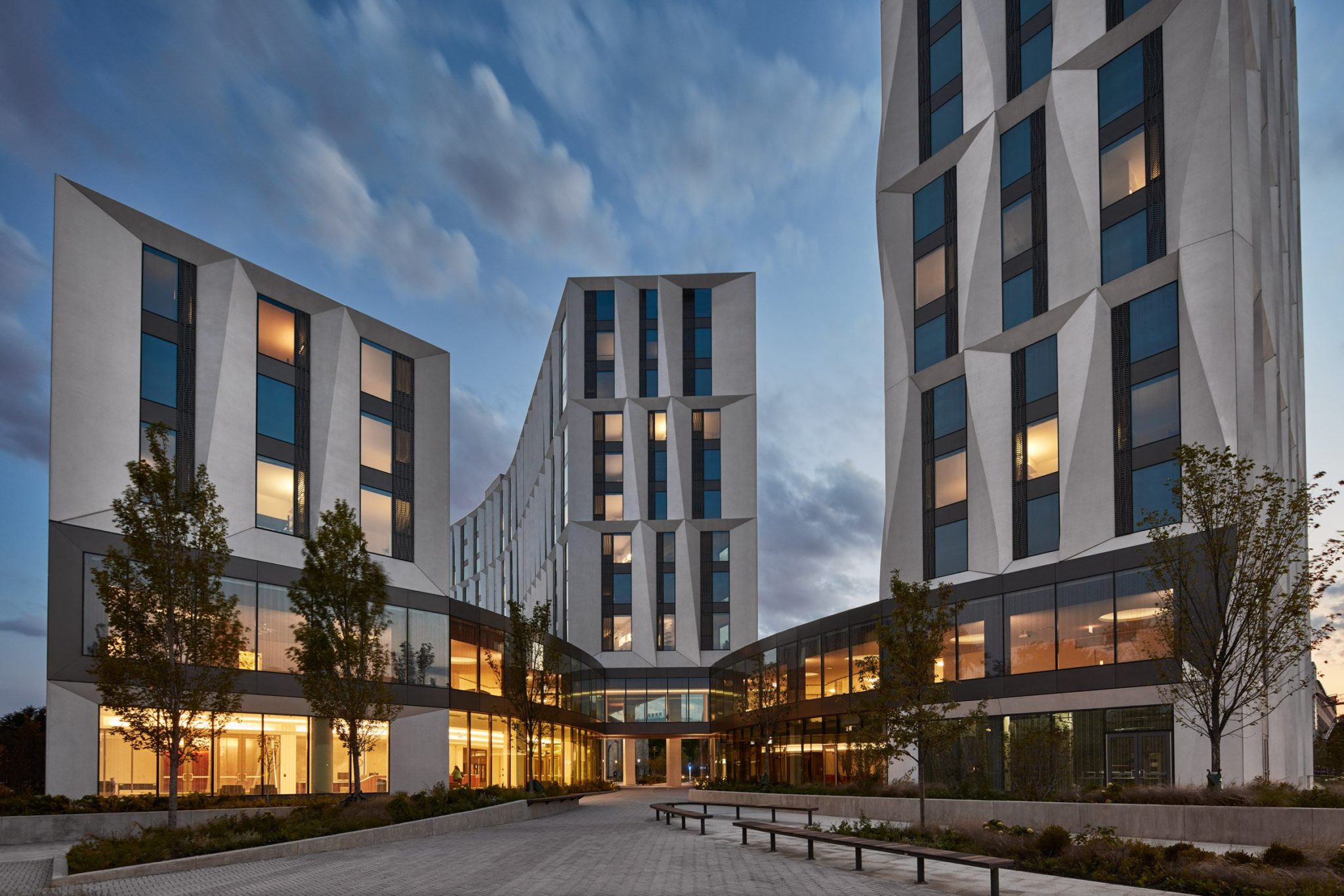 Tom Harris Photography provides an emotive shot of US firm Studio Gang's student residential complex for the University of Chicago that features towers sheathed in glass and sculptural panels