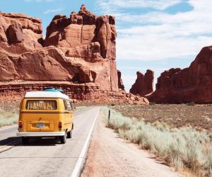 car on the road, rocks