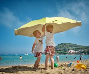 Babies under the umbrella
