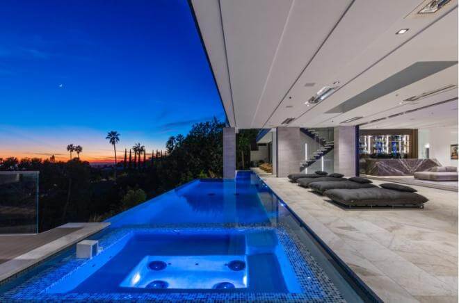 Enjoy a jacuzzi dip at Drake's pad.