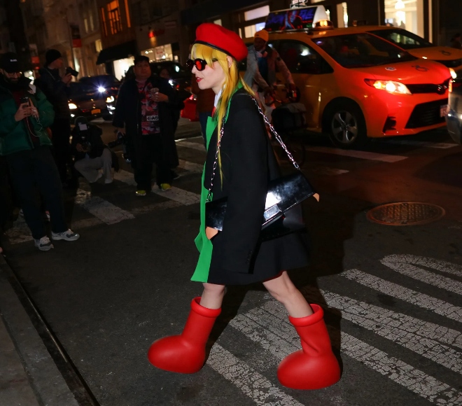 MSCHF'S Big Red Boots on the streets. Photo: Phil Oh