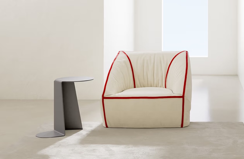 'Crease' armchair with exposed red seams. Image: Meritalia.