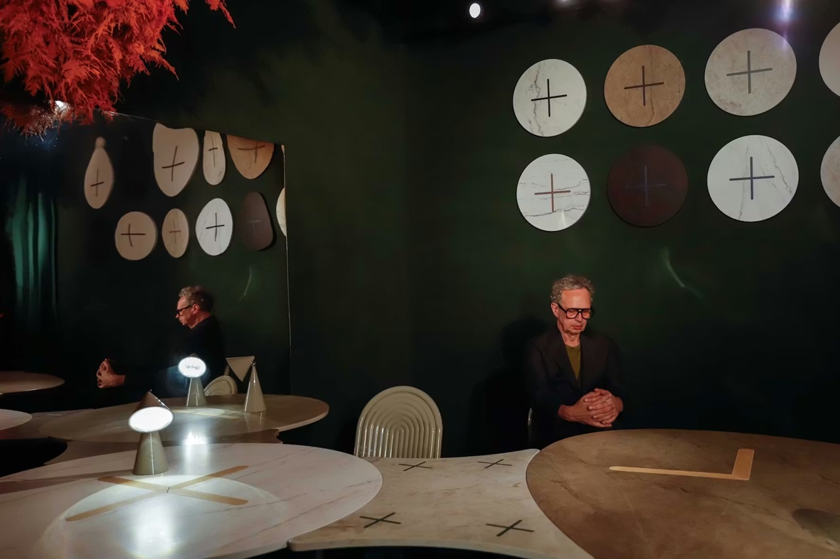 Tom Dixon with his 'Axis' tables at his event during Milan Design Week 2026. Image: Cosentino.