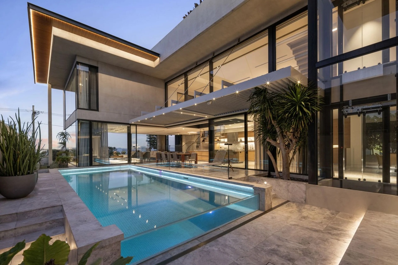 Floor-to-ceiling glass windows benefit from better glazing to reduce heat from sunlight streaming in. Image: Stone Real Estate.