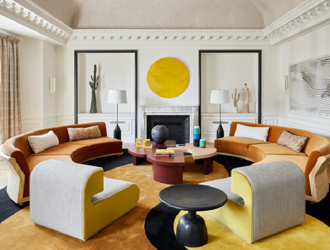 A spacious living room affording a circular, modular sofa system. Image: Savills.