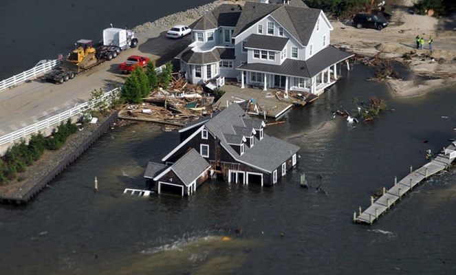 Luxury homes destroyed by flood or rising sea levels. Image: The Ecologist.