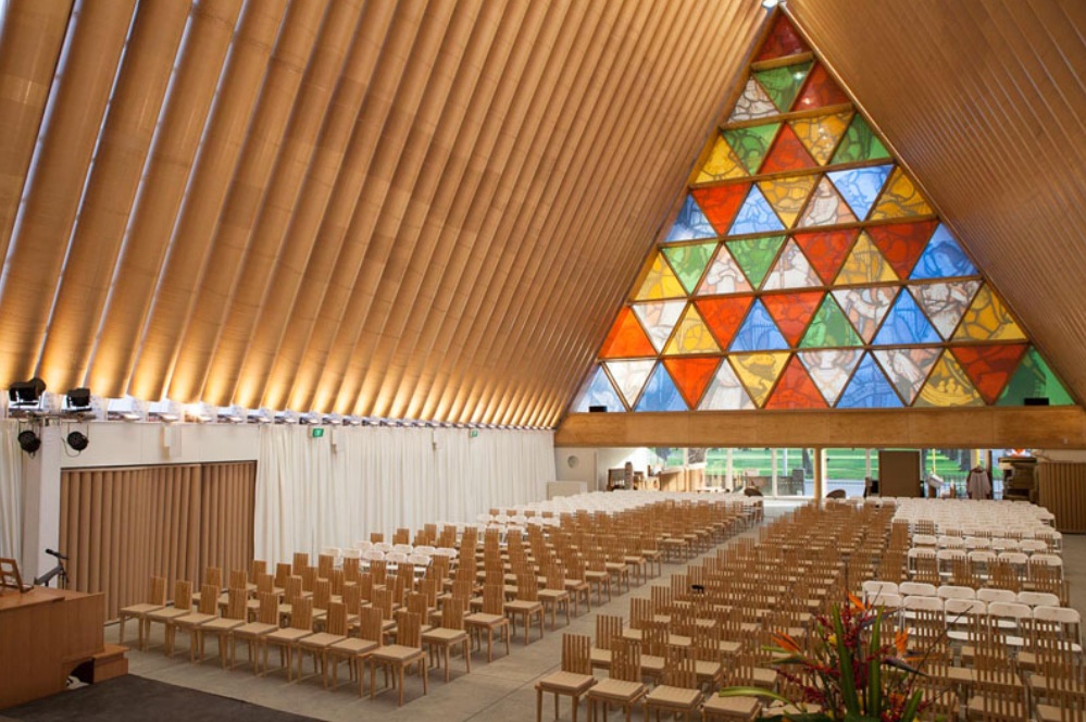 The Carboard Cathedral in New Zealand is made from paper tubes of equal length and 20-foot shipping containers to form the triangular shape. Image: Shigeru Ban Architects.